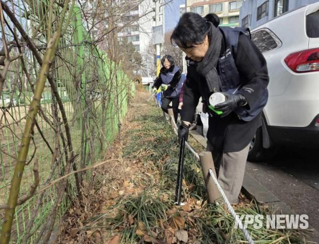 수원시 팔달구 우만2동, 설 명절 맞아 '우리 동네 쓰레기 줍줍'